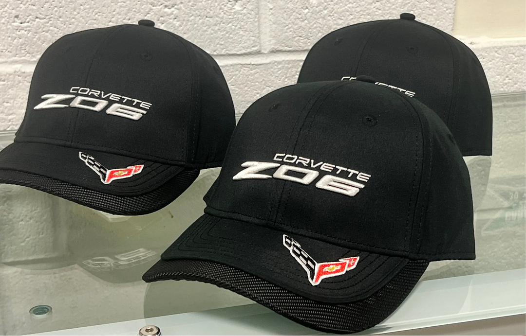 Black Z06 Corvette RW hat featuring a Winged Logo, stylish cap with embroidered Corvette branding and adjustable strap.