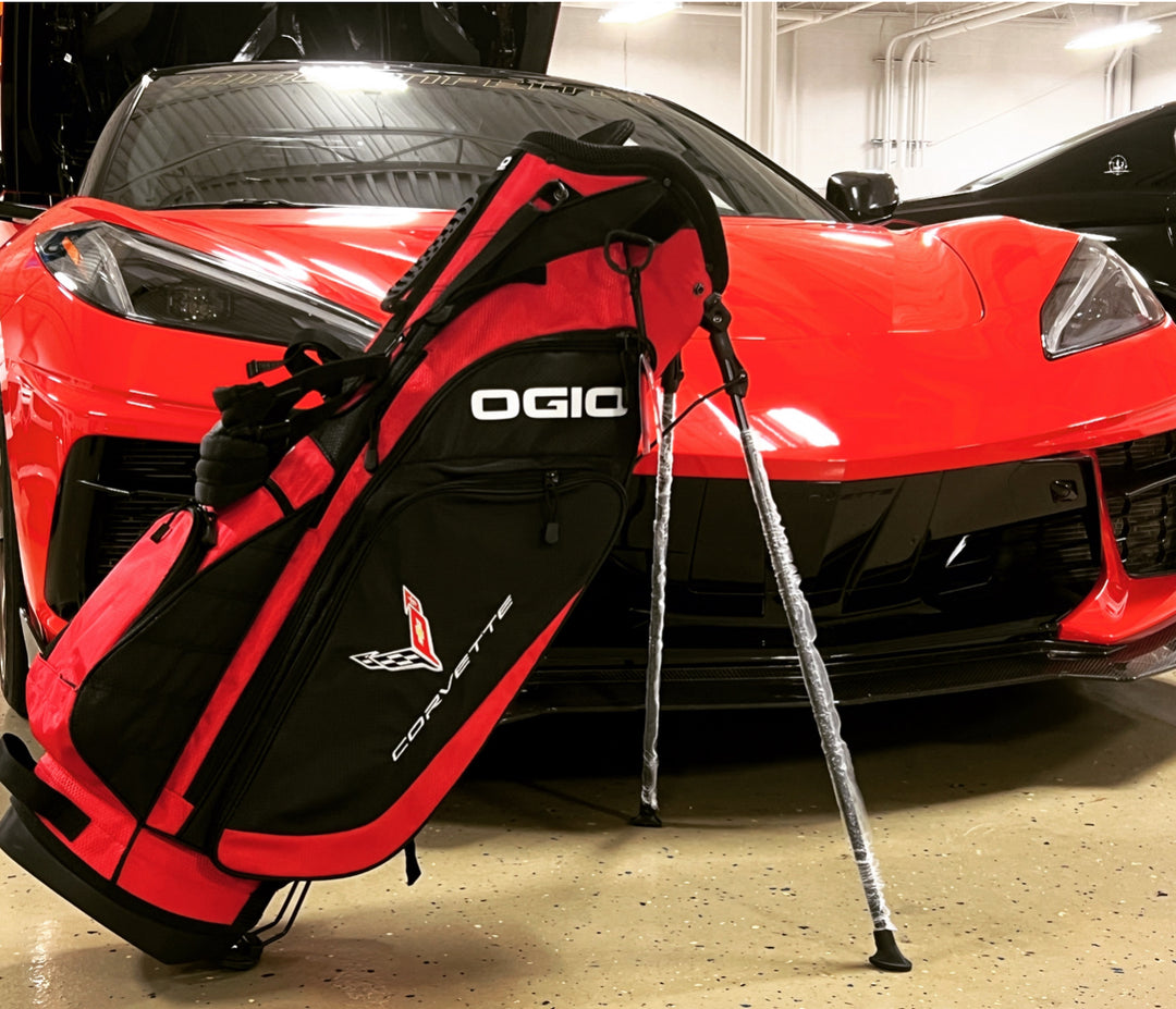 Red C8 Corvette-themed golf bag by Team Lingenfelter, featuring multiple compartments and a sturdy stand for easy carrying.