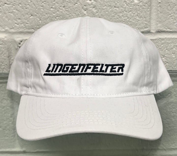 White cap with 'Lingenfelter' logo on a textured wall background