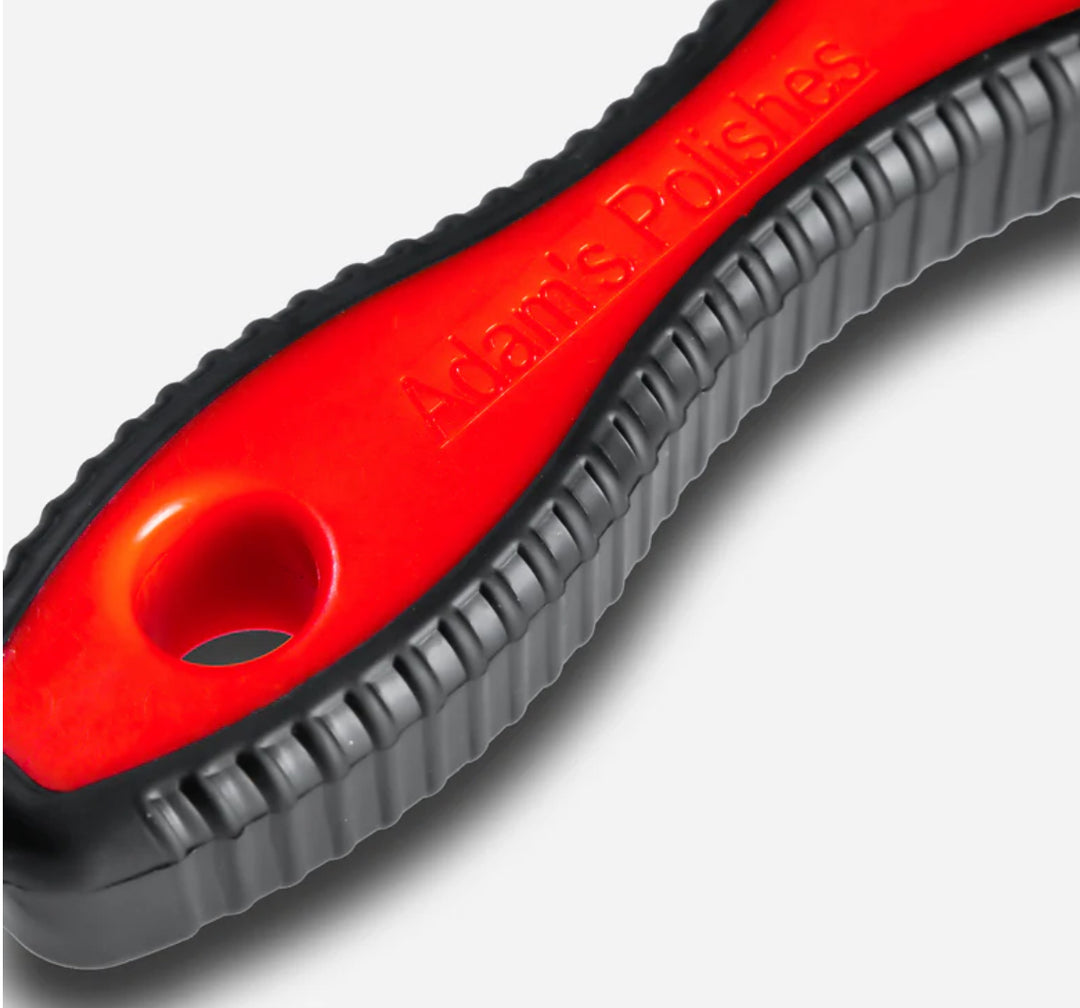 Team Lingenfelter Adam's Tire Brush for cleaning car tires with a sturdy handle and bristles for thorough tire detailing.