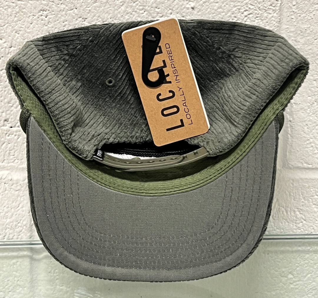 Gray cap with green bill and 'Locally Inspired' tag on a white background