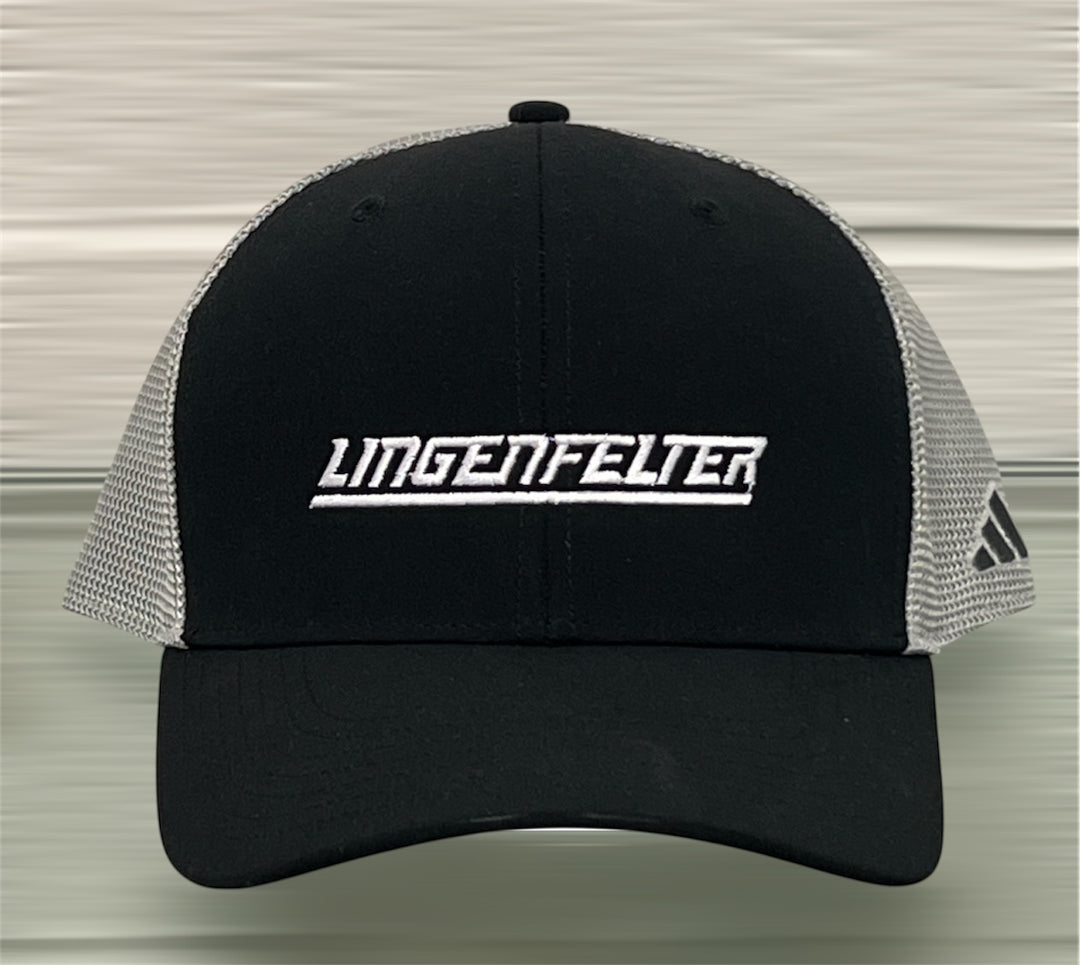 Black and white cap with 'Lingenfelter' logo on a neutral background