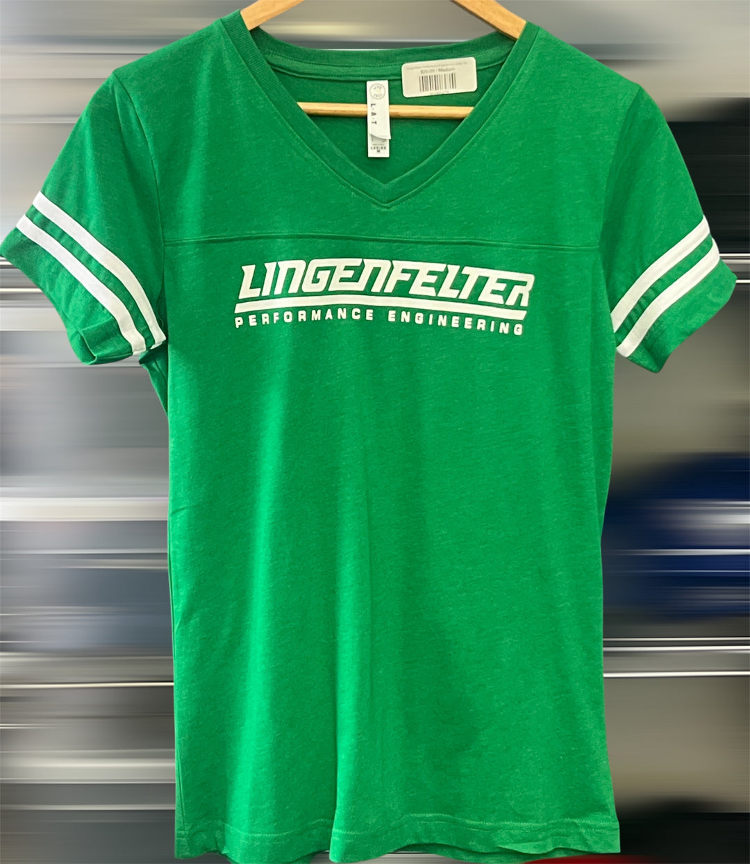 Team Lingenfelter ladies shirt, a stylish women's tee with Lingenfelter Performance Engineering branding, shown on a hanger.