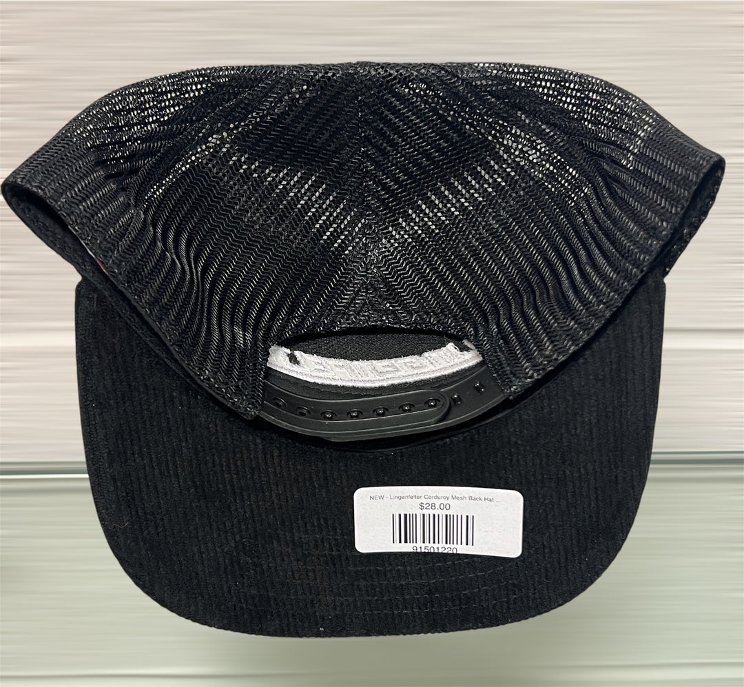 Black mesh cap with a brand label on a light gray background