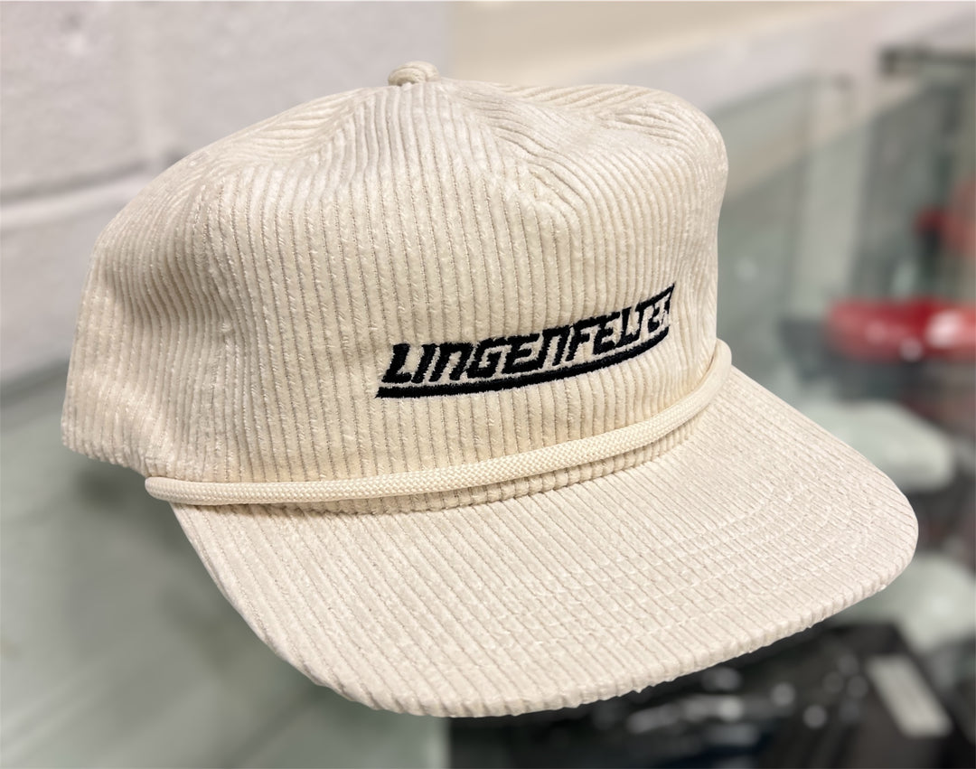 Beige corduroy cap with 'Lingenfelter' logo on a blurred background
