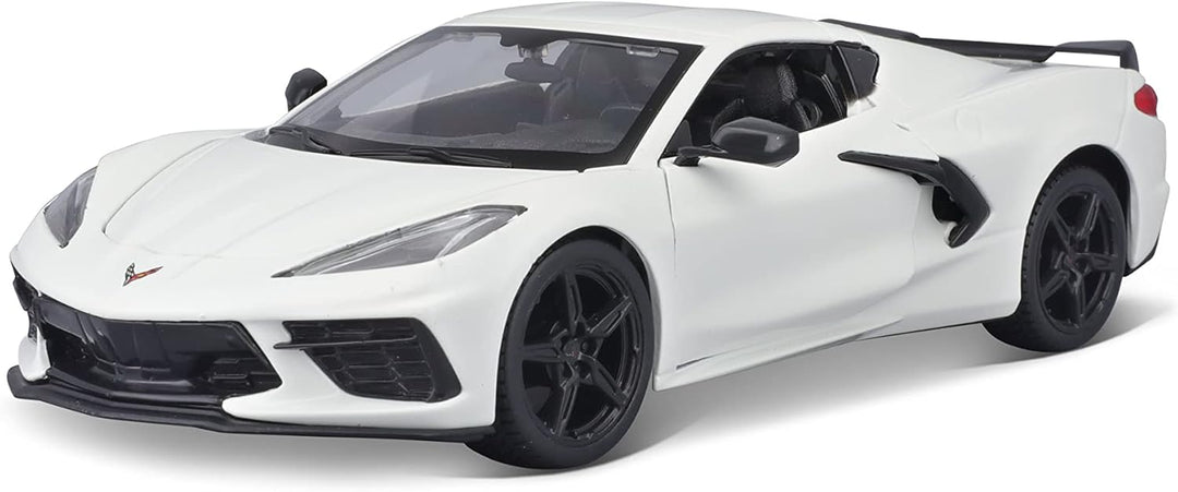 White diecast 1:24 scale Chevrolet Corvette Stingray Coupe by Maisto, part of the Assembly Line 2020 series, detailed model car.