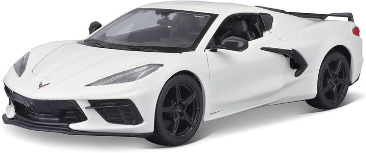White diecast 1:24 scale Chevrolet Corvette Stingray Coupe by Maisto, part of the Assembly Line 2020 series, detailed model car.