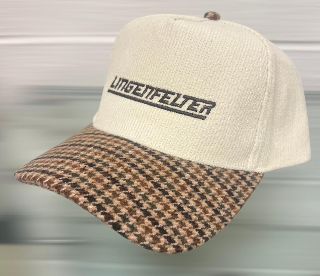 Cap with houndstooth pattern brim and beige top, featuring 'Lingenfelter' branding.