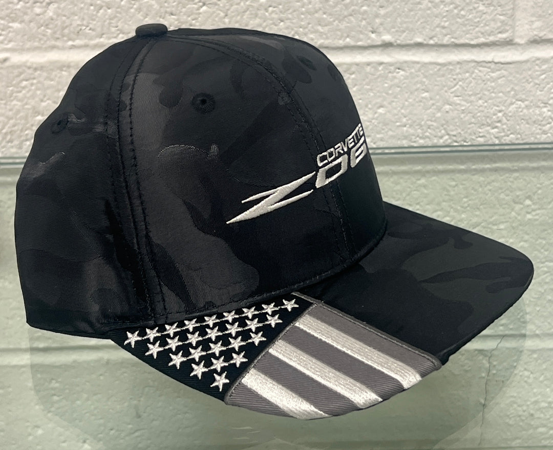 Side view of Lingenfelter Race Gear C8 Corvette Z06 camo flag black hat with embroidered Corvette Z06 logo.