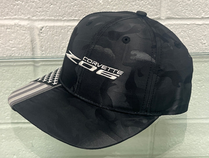 Side view of Lingenfelter Race Gear C8 Corvette Z06 camo flag black hat, showcasing the stylish design and branding.